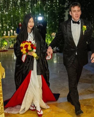 Joy Vogelsang son Nicolas Cage with his wife Riko Shibata.